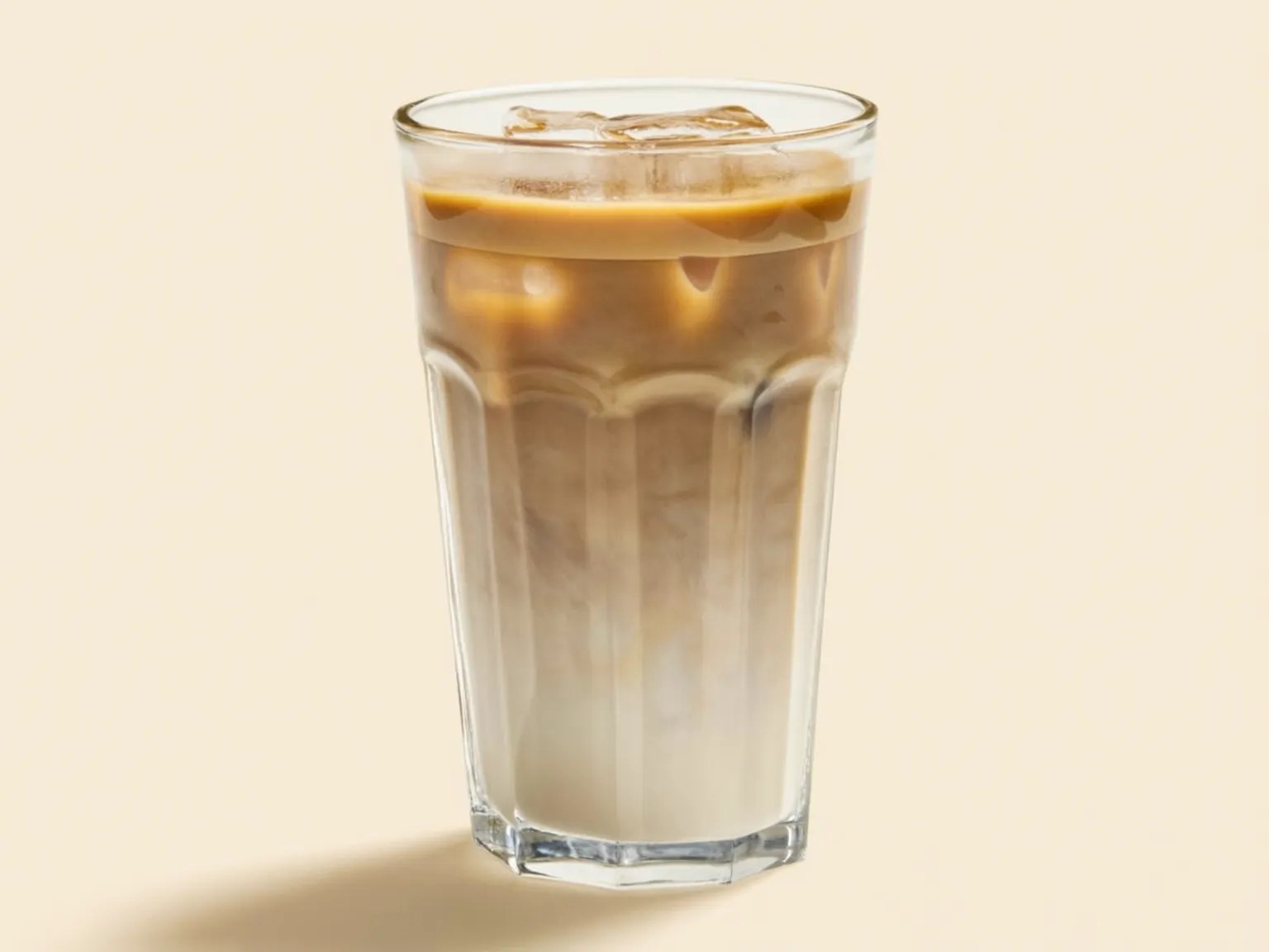 A tall glass of iced coffee